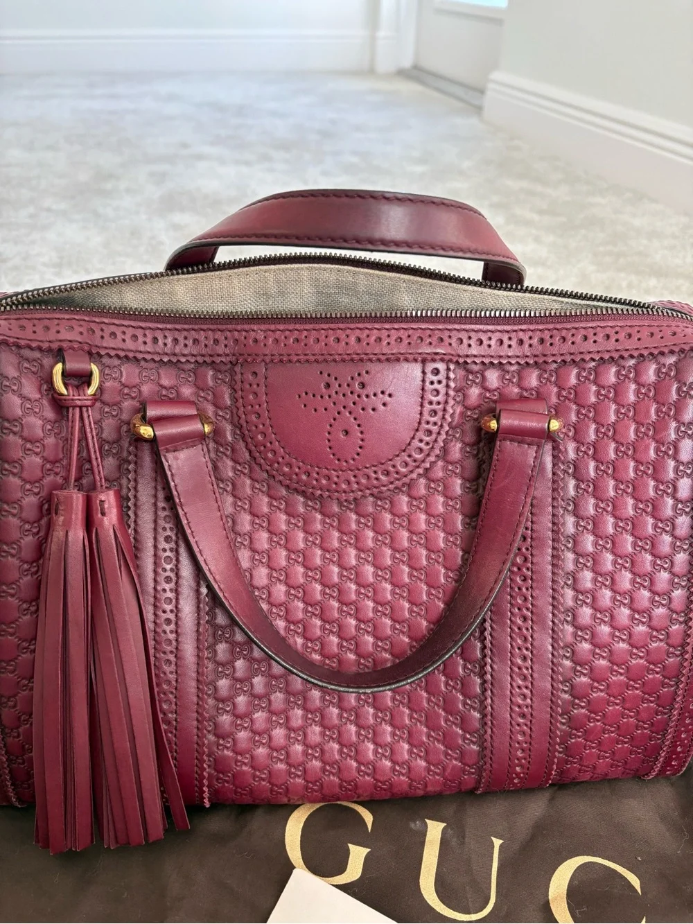 Gucci Burgundy Leather Tassel Satchel with Embossed Monogram